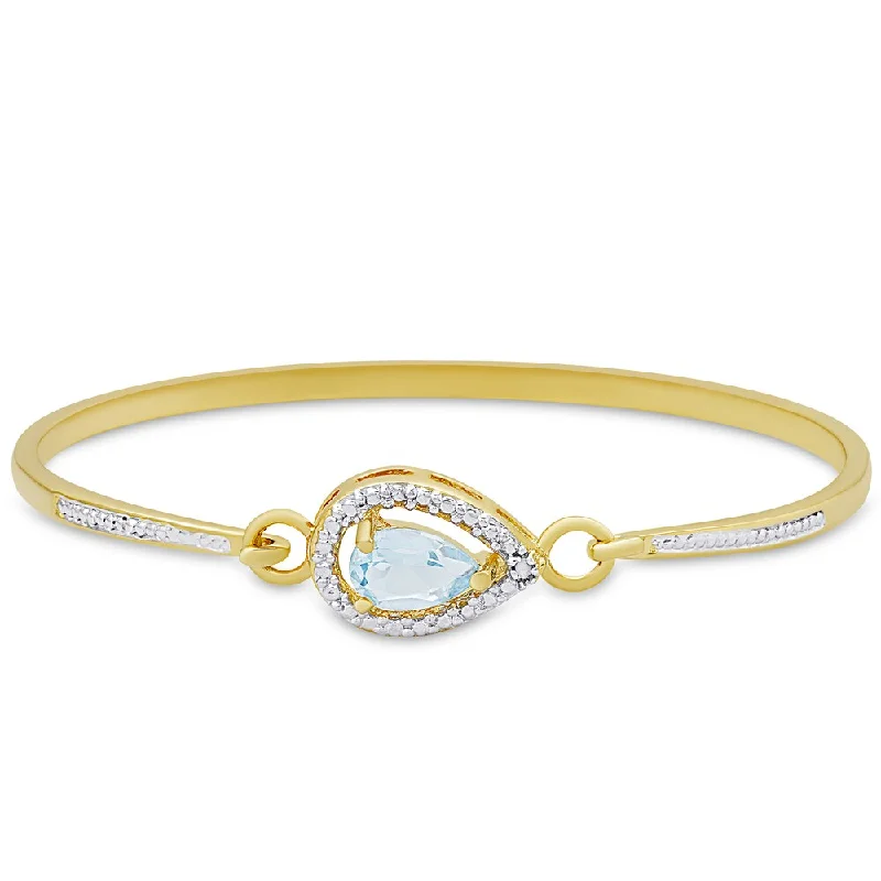 Octagonal gem bracelet-Dolce Giavonna Gold Overlay Blue Topaz and Diamond Accent Pear Design Bangle