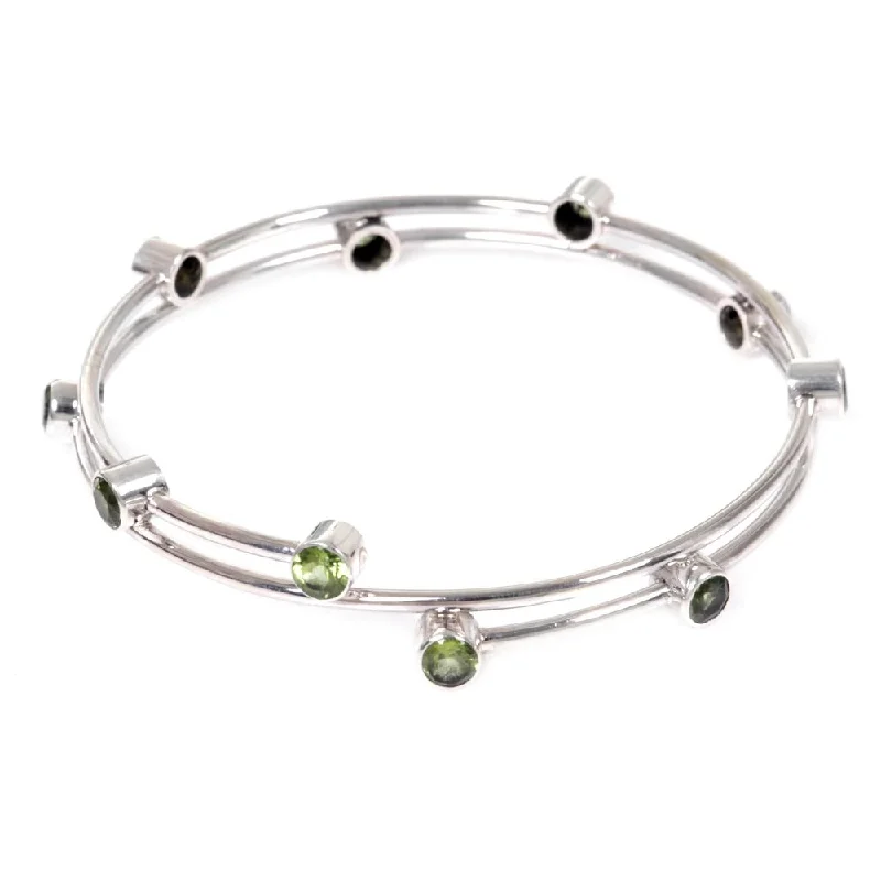 Subtle color bracelet-Peridot Bangle Bracelet, 'Orchid Twist In Green' (Indonesia) - 7'6" x 9'6"