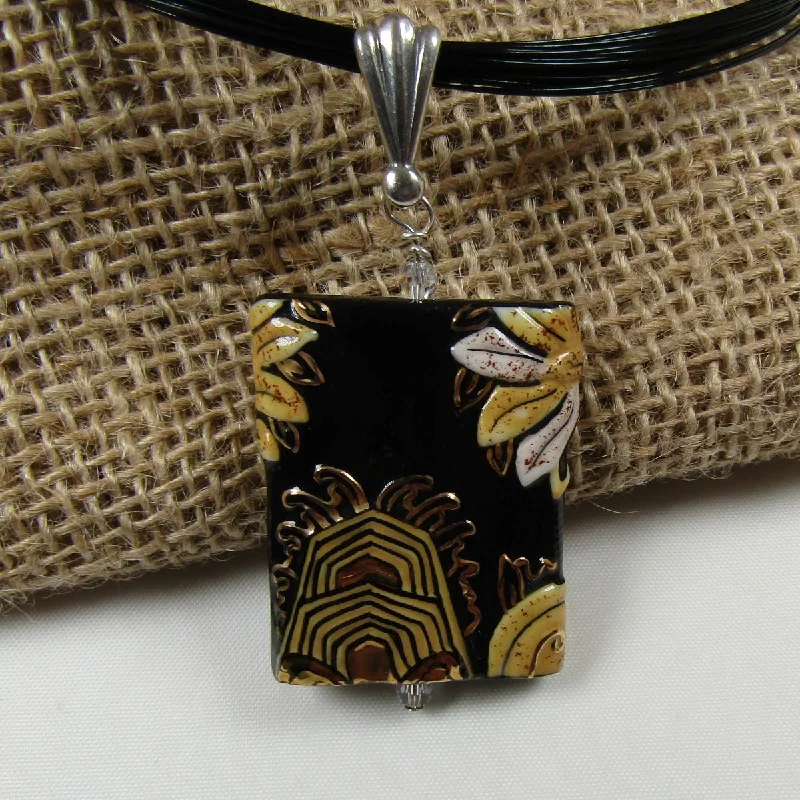 Bud drop necklace-Handmade Artisan Black and Gold Pendant on Multi-strand Black Necklace