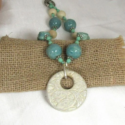 Ragged edge necklace-Cream Swazi Pendant on Handmade Artisan Bead Necklace