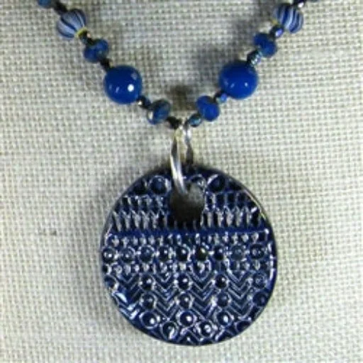 Pointed edge necklace-Blue Swazi Pendant Necklace with Handmade Polymer Clay Accents.