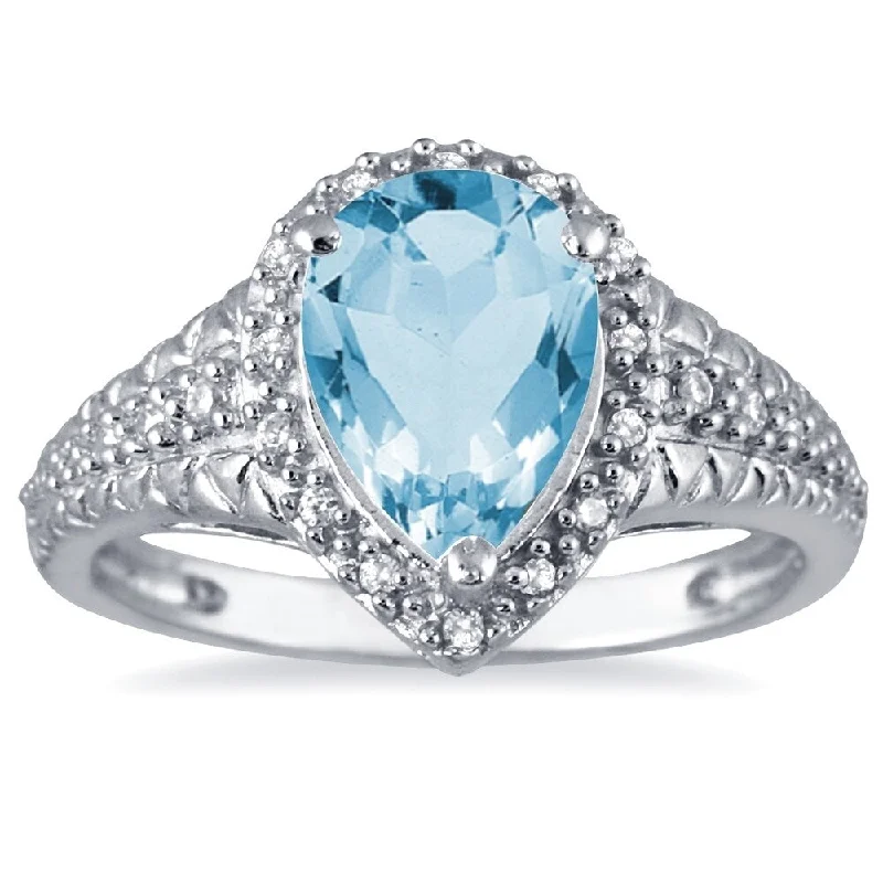 Shoreline wave ring-2 Carat Pear Shaped Blue Topaz and Diamond Ring in 10K White Gold