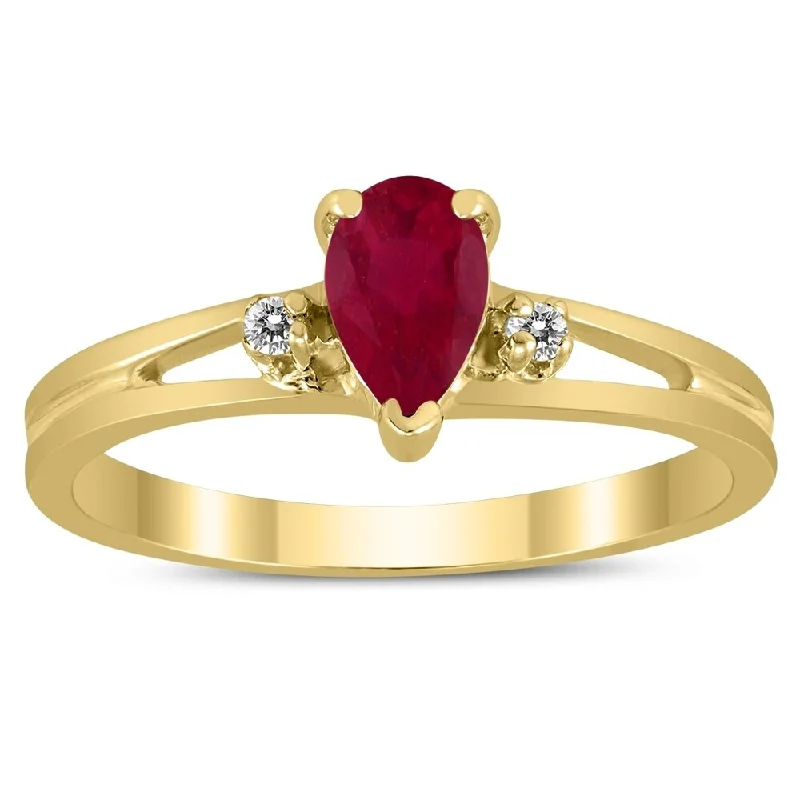 Coiled effect ring-6X4MM Ruby and Diamond Pear Shaped Open Three Stone Ring in 10K Yellow Gold