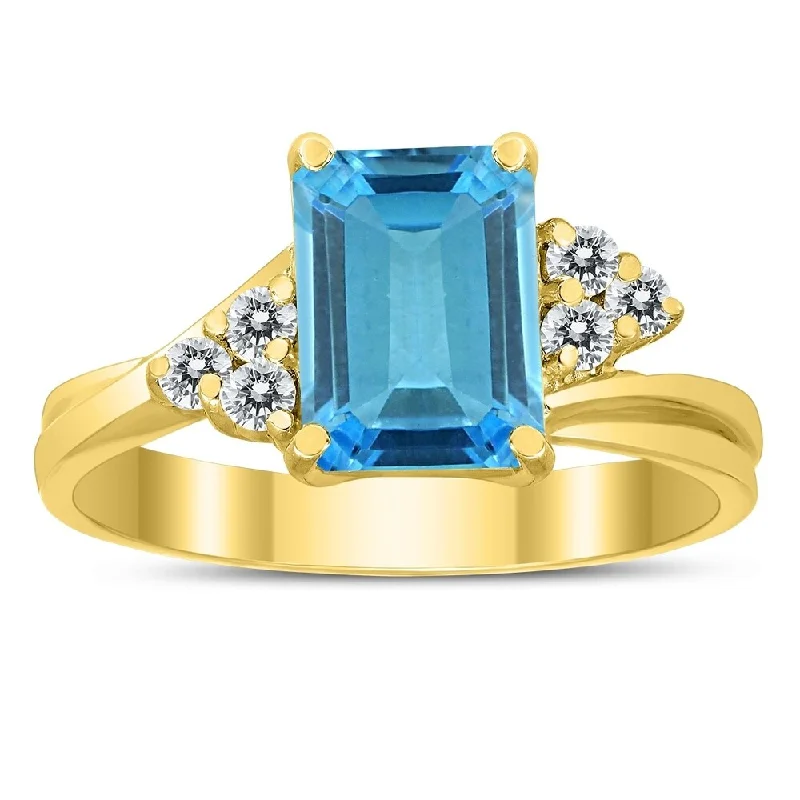 Pleated design ring-8X6MM Blue Topaz and Diamond Twist Ring in 10K Yellow Gold