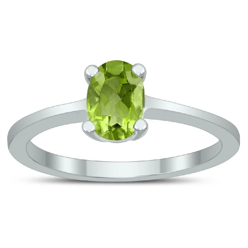 Kelp frond ring-Oval Solitaire 7X5MM Peridot Ring in 10K White Gold